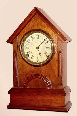 Kroeber Clock Co., "GOTHIC", walnut cased mantel clock, 8-day time and gong strike, C.1875 — Antique Clocks Price Guide