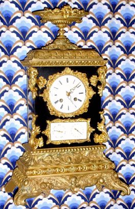 French, ormolu and slate double dial calendar clock, the dials set into a piece of ebonized walnut, and the sides of black slate, silk thread suspension, showing date and day of the week (in abbreviated French) C.1850 — Antique Clocks Price Guide