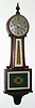 New Haven Clock Co., WARING model, 8-day spring banjo clock with green/ gold tablets. C.1928.