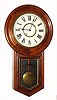 New Haven Clock Co., "REGULATOR", walnut cased round top long drop, 8-day timepiece, spring movement. C.1880.