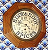 E. Ingraham and Co., solid oak octagon timepiece with paper advertising dial for "Eddy and Eddy Spices, St. Louis Mo, since 1881.", 8-day, spring (pendulum movement). C.1915.