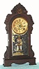 Ansonia Clock Co., "EQUAL", walnut parlor clock, 8-day, time and bell strike 8-day with bell alarm. C.1883.