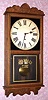 New Haven, New Haven Conn, "REFEREE" model, 8 day time only brass mvt in oak case with 12" dial, spring driven. C. 1911.