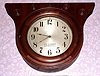 Seth Thomas, Thomaston, Conn. "DOUBLE DIAL CEILING" model, 30 day time double spring brass mvt No. 86 in mahogany case with concentric raised mahogany accents with 14" metal dials, private label for "GEO. P. THOMAS 64 LINDEN ST. BROOKLYN. N.Y." C. 1935.