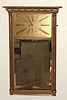 Waltham, Waltham Mass, Mirror clock with 8 day balance mvt (rugged car clock movement) in gilded case with 9 1/2"H x 15"W metal Art Deco style dial set above a looking glass. C. 1925.
