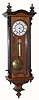 German, Small "Vienna Regulator", 1-wt, time only in a walnut case with ebonized accents, running 4 to 5 days. C.1880.