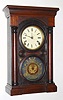 E. Ingraham and Co., ARCH COLUMN, rosewood shelf clock, 8-day time and gong strike, spring. C.1861.