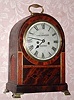 English, Regency era bracket clock, 2-fusee, bell striking, in a mahogany veneered case with latched bezel. C.1830.