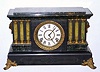Seth Thomas ADAMANTINE shelf clock, shown by Ly as "Unlisted No. 1", one of the more attractive models with 3 columns on each side of the dial. C.1900.