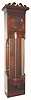 American Case only, custom made to match a mahogany parlor set, with a bow front, slide-out door, will fit most any large movement with 12.3" bezel and up to 10" deep; currently set up for a pinwheel movement with front hung pendulum. C.1900.