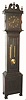 American, fumed oak tall case clock, probably by Ithaca Clock Co., 2-weight ladder chain movement striking on gong. C.1910.