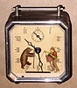 Keebler Clock Co., ORGAN GRINDER animated alarm clock, showing the grinders arm playing the organ briskly, opposite a bear in dance pose. C.1930.