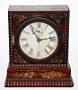 Ripple molding rosewood veneered clock case. This case probably had a small lever timepiece movement by Forestville/ J.C. Brown, but now with a battery movement and hands. C.1850.