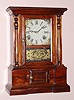 Atkins Clock Co., LONDON model shelf clock in rosewood, 8-day time and strike, spring, C.1870.