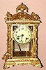 Ansonia Clock Co., NORMA, 4-glass crystal regulator, with Lever 'scape movement, 8-day time and strike, in a fancy cast case with Corinthian columns, C.1904.