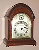 German, Winterhalder and Hofmeier, Neustadt, Baden, made for J. E. Caldwell and Co.,, Philad'a, Westminster Chime mantel or bracket clock with arched silvered dial, and with F/S regulation in the arch, 8-day, spring, C.1900,
