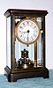 German "Anniversary" 400-day timepiece in a heavy 4- glass, crystal regulator case, serial No. 7677, by Kienzle, plate 1008 (round). Circa 1904