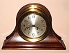 Chelsea Clock Co., CHELSEA model ship's bell clock on mahogany base/stand, serial 636644, 6" dial, hinged bezel with latch, C.1959