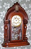 Waterbury Clock Co, Walnut Parlor clock with single barrel pendulum, note full round fluted columns and Diana bust in crest, 8-day spring, C.1880