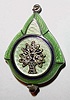 Swiss Pendant watch, green guilloche enamel, and the reverse with 11 faceted pastes in a silver tree, with a closely matching silver chain with green accents. Sapphire Cabuchon crown.