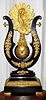 French, ebony lyre pinwheel, the movement contained in a brass globe, flattened in the front to allow for the dial, and the entire assembly swinging as a pendulum, the crutch extending from the bottom of the movement and engaging a vernier beat set thumb screw.