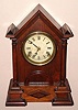 Waterbury Clock Co, "BLACK WALNUT EXTRA GOTHIC PILLAR" (the actual catalog name), 8-day time and strike mantel clock, C.1857