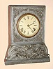 Chauncey Jerome, New Haven, Cast front shelf clock, 8-day time and gong strike, C.1850