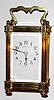 French, brass cased carriage timepiece, in a multi-piece case with nut type finials on top and feet on the base, retailed by Tiffany and Co (good signature on dial), c.1900