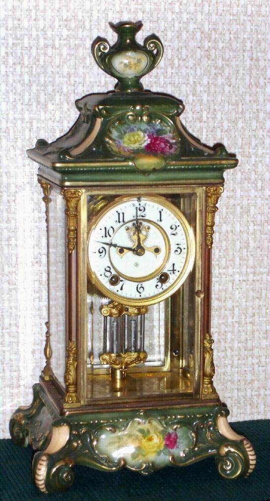 Ansonia Clock Co., New York, "CRYSTAL REGULATOR No. 1", 4- glass mantel regulator in green with floral decorations and gold accents, 8-day with open escapement and striking on a gong. — Antique Clocks Price Guide