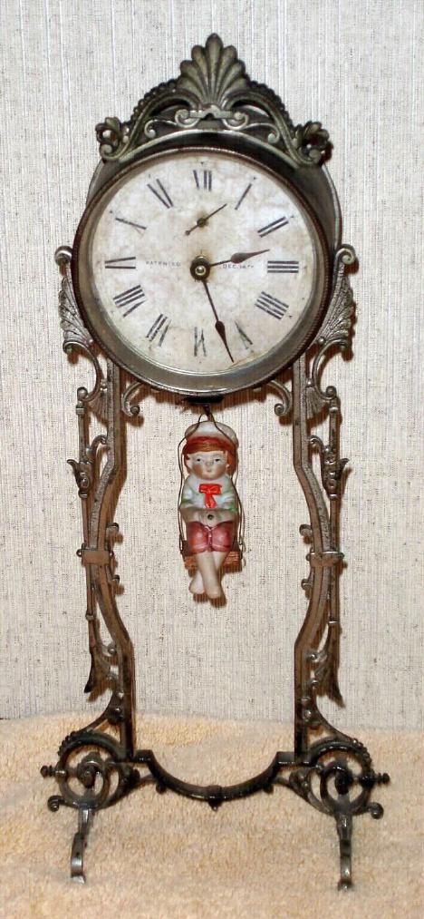 Ansonia Clock Co.., Brooklyn, New York, "JUMPER No. 2", 1-day spring novelty, with replacement doll. — Antique Clocks Price Guide