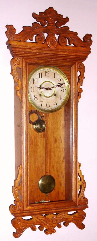 Waterbury Clock Co., "Springfield", Circa 1906, 8-day time/strike wall clock, spring movement. — Antique Clocks Price Guide