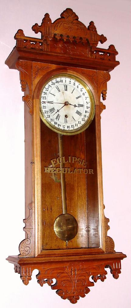 E. N. Welch Mfg. Co., "Eclipse", Circa 1890, 8-day calendar wall timepiece. — Antique Clocks Price Guide