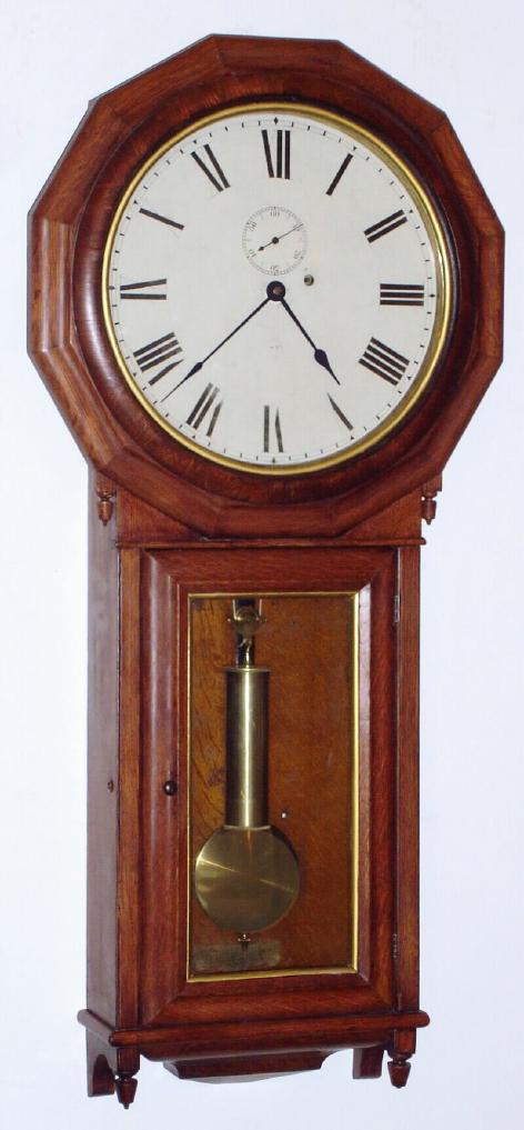 Seth Thomas Clock Co., Thomaston, CT, "REGULATOR No. 3" with 12 sided top bezel, in oak, 8-day weight driven timepiece, c.1870 — Antique Clocks Price Guide