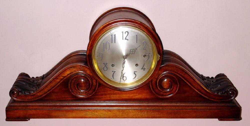 Seth Thomas Clock Co., C.1913, "CHIME CLOCK No. 258" , 8-Bell Sonora chime in a larger than life tambour case with carved accents and with 8 inch dial. Side lever for chime/silent and for tune selection {Whittington and Westminster}. — Antique Clocks Price Guide