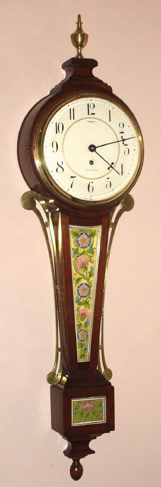 Waltham Clock Co., Waltham, Mass, for TIFFANY and Co., unusual Art Deco banjo clock with tapered waist and very small lower box, 8-day time only lever movement, clock serial No. 11388 — Antique Clocks Price Guide