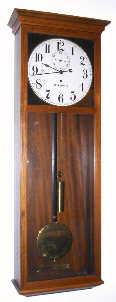 Seth Thomas Clock Co.,"REGULATOR No. 80", C.1915, large mahogany cased jeweler's timepiece, with heavy iron movement bracket and robust model 68 trapezoid movement, with beat-set adjustment at top, seconds hand and maintaining power, single weight, 8-day, disc pend. — Antique Clocks Price Guide