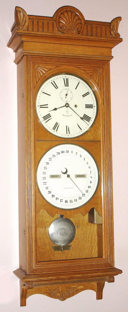 Seth Thomas Clock Co., Thomaston, Conn, OFFICE CALENDAR No. 12, in oak, 8-day, double dial perpetual calendar, weight driven. — Antique Clocks Price Guide