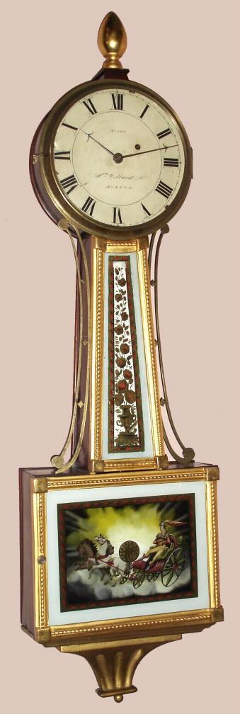 Boston area banjo clock, C.1820, dial signed: No. 1837, A. Willard, Jr., Boston, weight driven, eight day with barbed hands, and with a bracket of the same period, currently detached. — Antique Clocks Price Guide