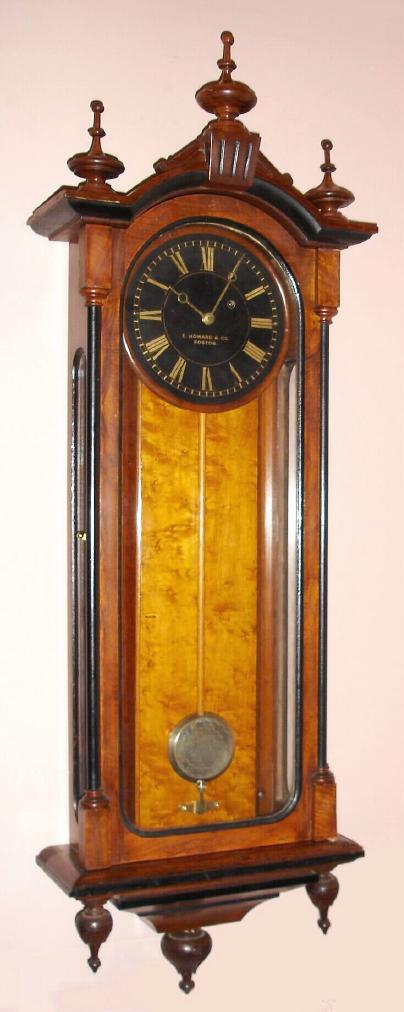 E. Howard and Co., Boston, REGULATOR No. 59-8, walnut cased timepiece in the Viennese style, commonly called a "Howard Vienna", this one with painted black dial. — Antique Clocks Price Guide