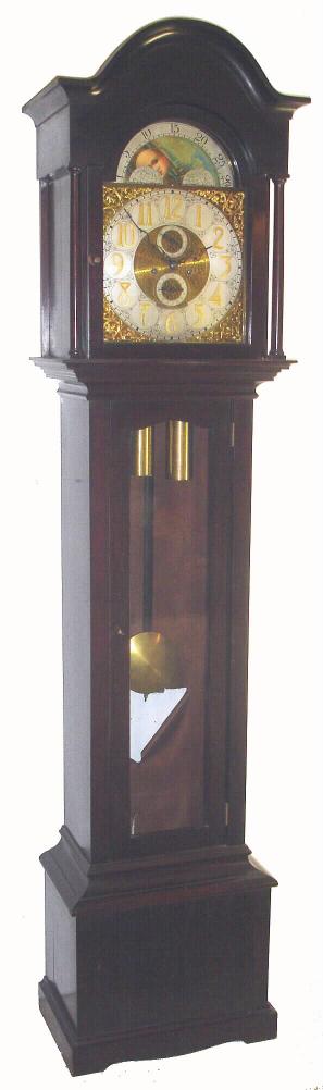 German, B+D Trademark, 2-wt gong striking tall clock with rolling moon brass dial, seconds hand below 12 and calendar above 6, in a dark mahogany case with glazed front door, and heavy lead filled pendulum. Dial with raised gilt Arabic numerals. — Antique Clocks Price Guide