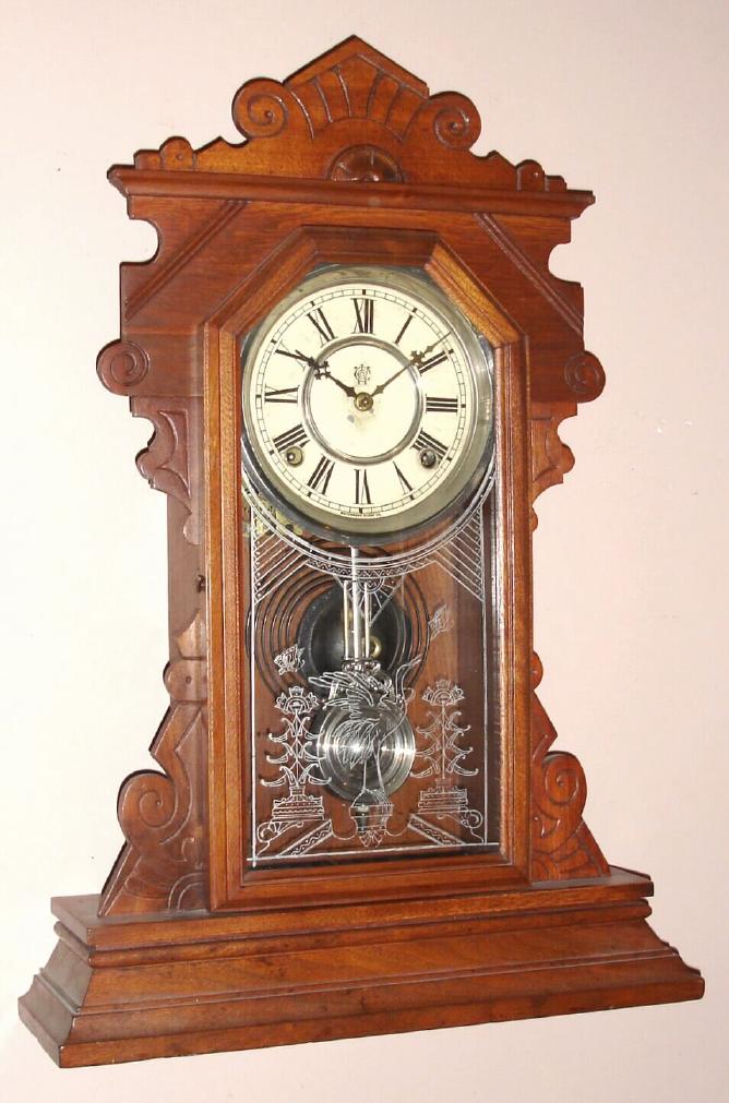 Waterbury Clock Co., Waterbury, Conn. "PAWLING" model 8 day, time and strike spring driven mvt in walnut case with Roman numeral, nickel plated dial pan 6" dial, c1891 — Antique Clocks Price Guide