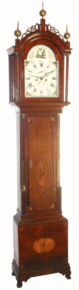 Boston area mahogany tall case clock, C.1820, 8-day, 12 inch painted arched dial, with the later applied signature of Simon Willard. The case with fan inlays on the waist and plinth, brass stop fluted quarter columns to the waist and stop fluted full columns and fret trim on the hood. — Antique Clocks Price Guide