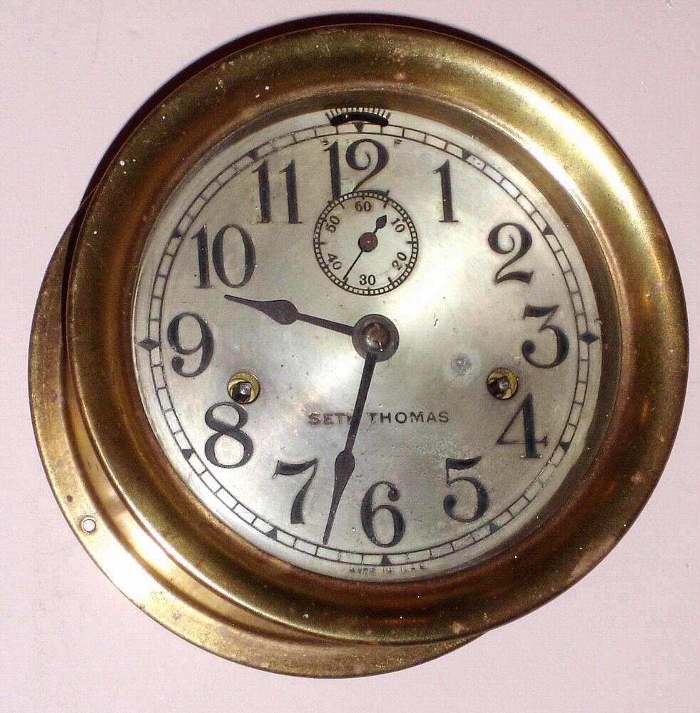 Seth Thomas Clock Co., ENGINE LEVER, c.1935, rolled brass tub and hinged bezel, with duplex spring lever timepiece movement No. 10. — Antique Clocks Price Guide