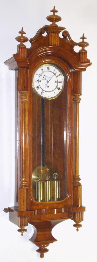 Austrian, John Barichar, 3-wt Grand Sonnerie, full quarter striking wall clock in a transitional light walnut case, C.1860. — Antique Clocks Price Guide