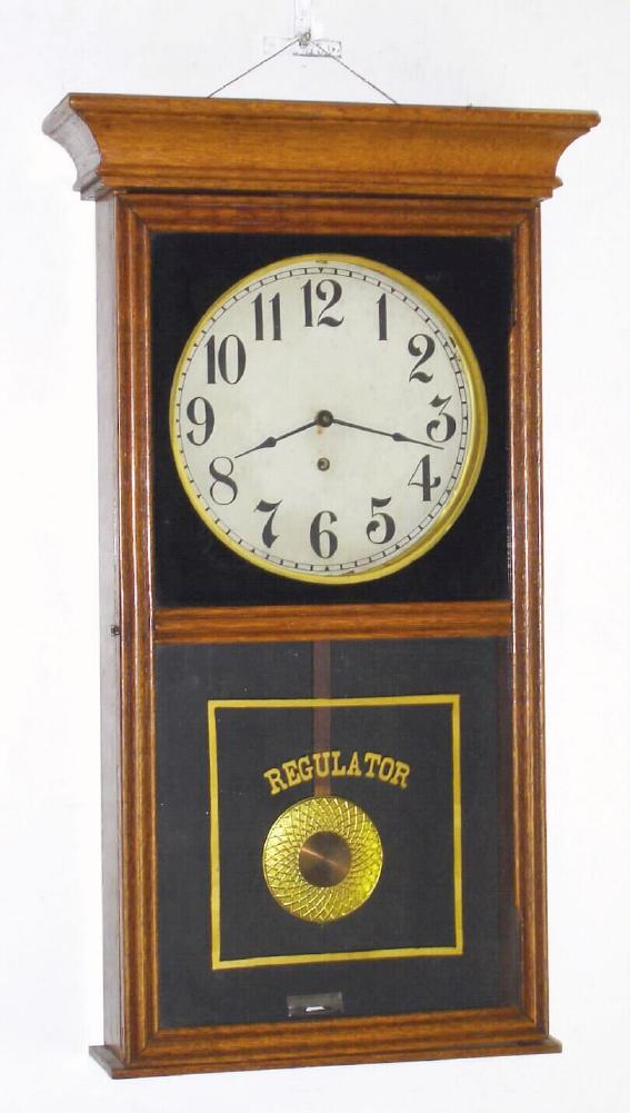 Unsigned American store regulator, 8-day timepiece, in an oak case, less bottom trim. — Antique Clocks Price Guide