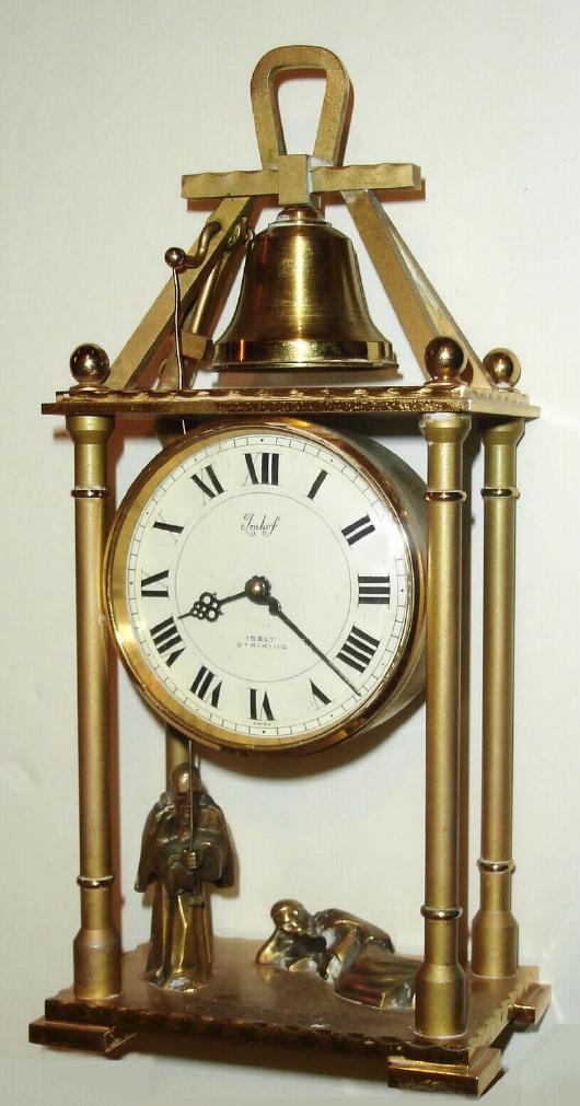 Swiss, Imhof, small Desk automaton, time and strike; two monks below, the left monk pulls a wire to ring the bell at top, once on the half hours and full count on the hours. Back wind and set lever movement, C.1970 — Antique Clocks Price Guide