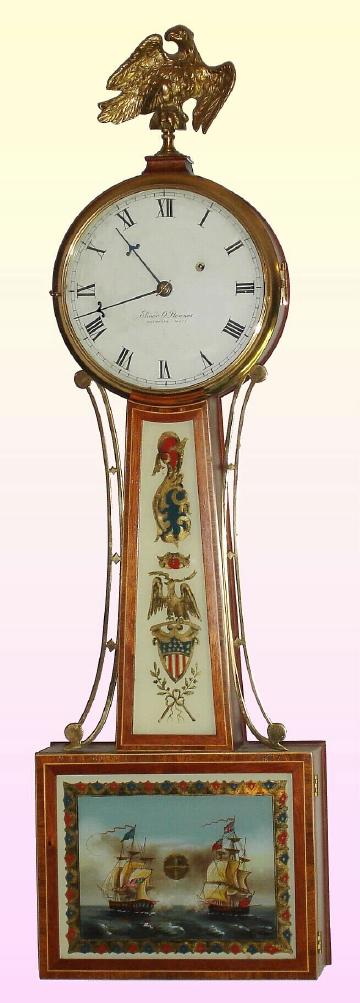 Elmer O. Stennes, Weymouth, Mass, banjo timepiece, mahogany cross-banded case, weight driven 8-day with a naval battle scene from 1812; this clock No. 12 of 1968. Dr. Newman drove to Weymouth and purchased this clock in Nov. '68, prior to Elmer murdering his wife on Dec 2, 1968; he drove back the following year and purchased the Stennes lyre banjo that is also in this sale. — Antique Clocks Price Guide