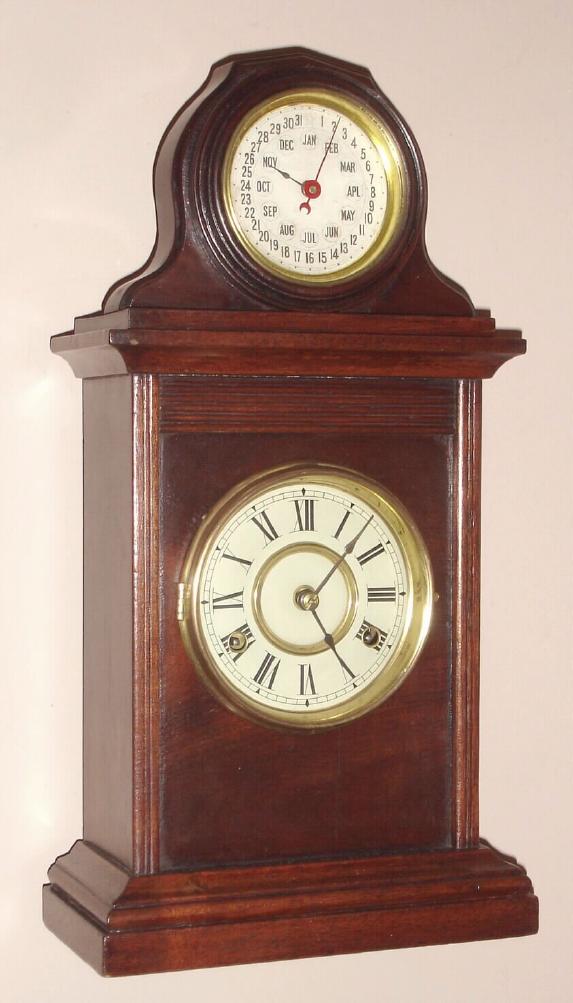 New Haven Clock Co., CABINET No. 4 WITH PERPETUAL CALENDAR, a hard to find double dial calendar in mahogany, C.1886, eight day. — Antique Clocks Price Guide