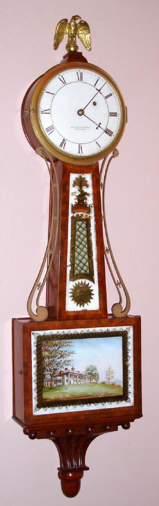 Walter H. Durfee, Providence, RI, weight banjo, cross banded case with Mt. Vernon tablet set, signed with Durfee circular logo imprint on movement of Waltham manufacture [dead beat mov't with maintaining power]. — Antique Clocks Price Guide