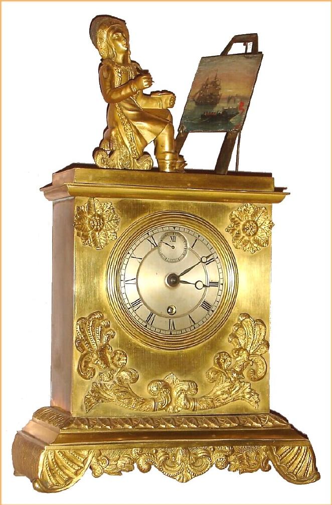 J. Charles a' Paris French gilded brass figural time only spring driven mvt with figure of Rembrandt working at easel with ship's scene on canvas and Roman numeral silvered dial with subsidiary seconds at 12, c1850 sNo. 6263 — Antique Clocks Price Guide